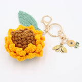 Little Ray of Sunshine: Handcrafted Knit Sunflower with Happy Charms