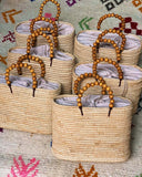 Handcrafted Moroccan Raffia Bags with Wooden Bead Handles