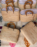 Handcrafted Moroccan Raffia Bags with Wooden Bead Handles