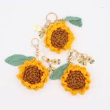 Little Ray of Sunshine: Handcrafted Knit Sunflower with Happy Charms