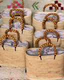 Handcrafted Moroccan Raffia Bags with Wooden Bead Handles